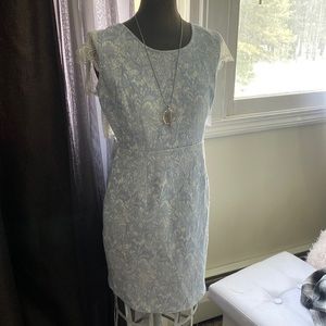 Beautiful blue lace back dress. Robins egg blue / power blue design. Fits 6-8